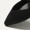 Close up of the pointed toe and rounded vamp of The Point Mary Jane in Black. 