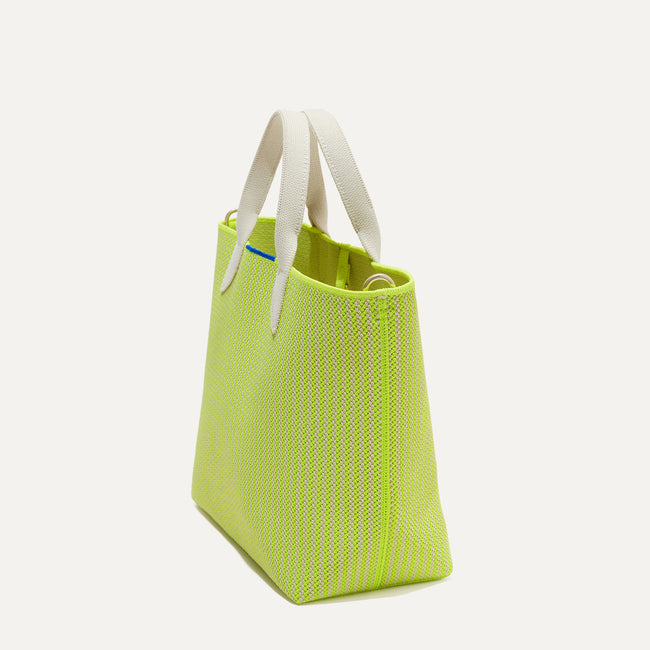The Lightweight Petite Tote in Chartreuse, shown from the side.