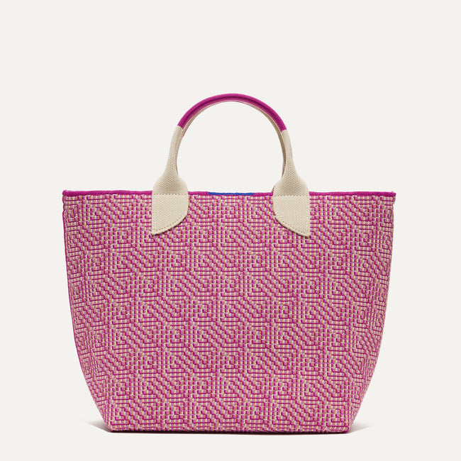 The Lightweight Petite Tote in Fuchsia Geo, shown from the front.