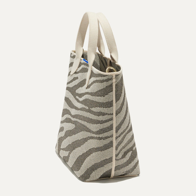 The Lightweight Petite Tote in Shimmer Zebra, shown from the side.