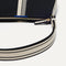 A closeup of The Casual Crossbody in Black & Ivory Stripe, focusing on the crossbody strap. 