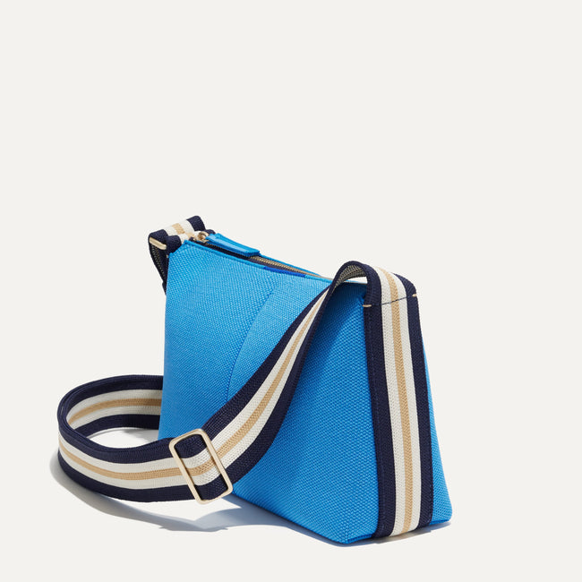 The Casual Crossbody in Cerulean Sky, shown from the side at an angle.