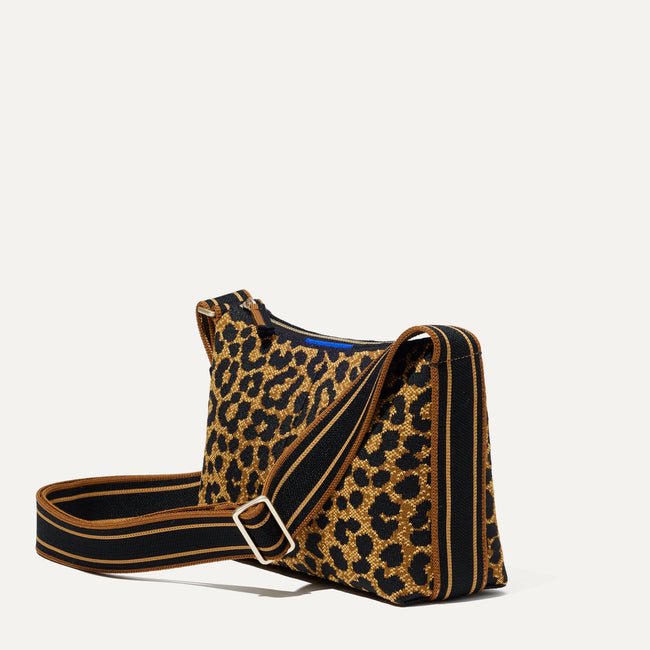 The Casual Crossbody in Classic Leopard, shown from the side at an angle.