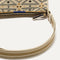 A closeup of The Casual Crossbody in Desert Mosaic, focusing on the crossbody strap. 