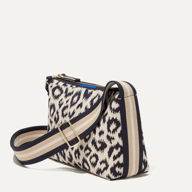 The Casual Crossbody in Sandy Cat, shown from the side at an angle.