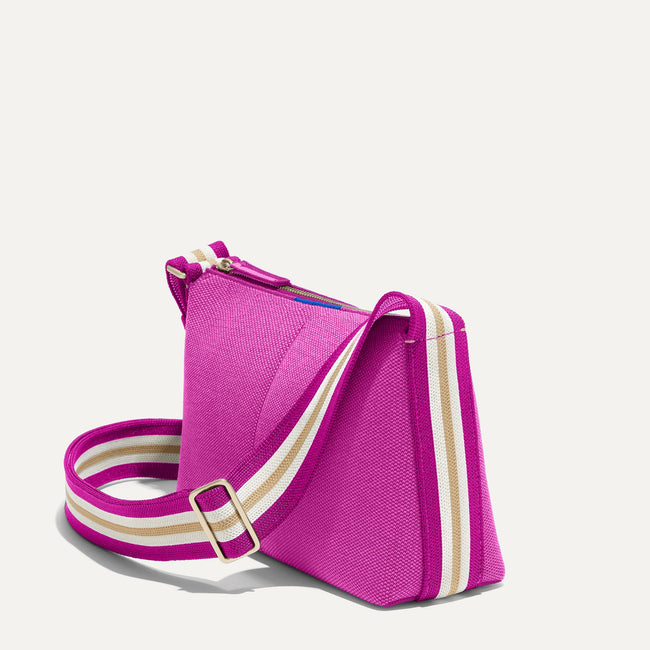 The Casual Crossbody in Tulip Petal, shown from the side at an angle.