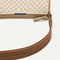A closeup of The Casual Crossbody in Vanilla Wafer, focusing on the crossbody strap. 