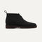 The Chukka Boot in Black shown from the side. 