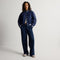 Alternate view of a model wearing The Casual Clog in Dove. 