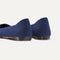 Close up of the heel of The Point II in Deep Navy, with Rothy's signature blue halo.