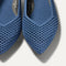 Alternate view of a model wearing The Point II in Deep Sea Mesh. 