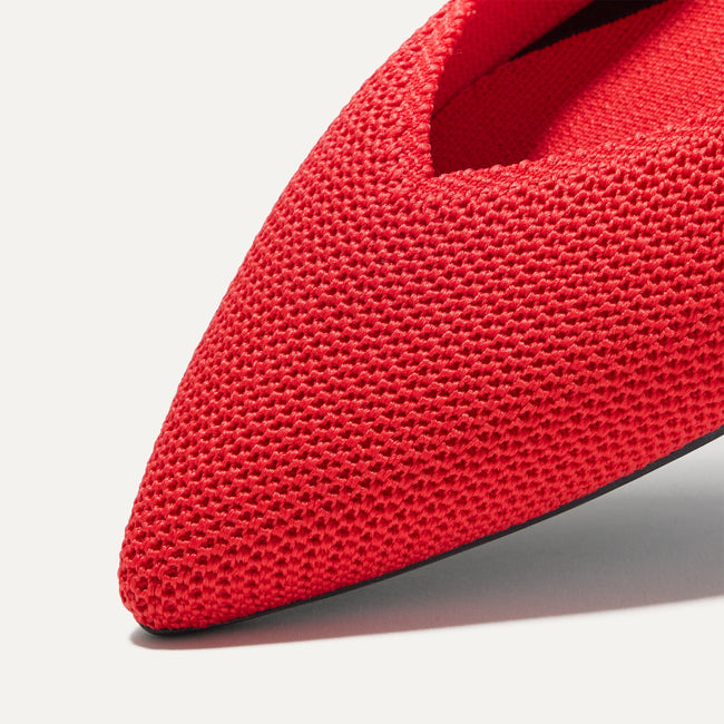 Close up of The Point II in Glamour Red, shown in diagonal view. 