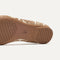 Close up of the outsole of The Point II in Gold Chantilly, shown in a diagonal view. 