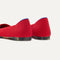 Close up of the heel of The Point II in Lollipop Red, with Rothy's signature blue halo.