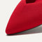 Close up of The Point II in Lollipop Red, shown in diagonal view.