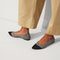 hover | Model wearing The Point II in Pebble Herringbone. 