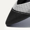 Close up of The Point II in Pebble Herringbone, shown in diagonal view. 