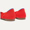 Close up of the heel of The Point II in Poppy Mesh, with Rothy's signature blue halo. 