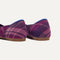 Close up of the heel of The Point II in Purple Plaid, with Rothy's signature blue halo. 