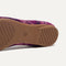 Close up of the outsole of The Point II in Purple Plaid, shown in a diagonal view. 