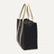 The Classic Tote in Black Coffee, shown from the side.