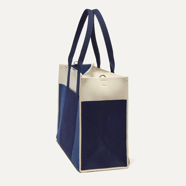 The Classic Tote in Luxe Blue, shown from the side.