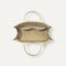 The Classic Tote in Buttercream, shown from above, with the interior exposed.