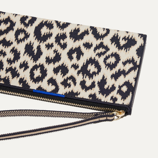 A closeup of The Wallet Wristlet in Sandy Cat, focusing on the wrist strap.