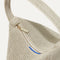 A close-up of the zipper detail and Rothy's blue halo on The Party Pouch in Diamond Sparkle.