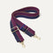 The Crossbody Strap in Dark Aubergine.