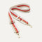 The Crossbody Strap in Maple Stripe.