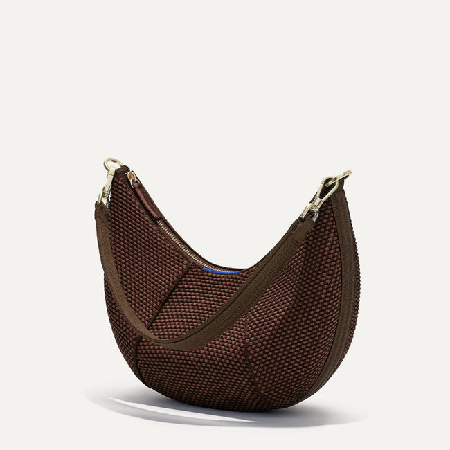 The Crescent Bag in Eclipse, shown from the side.