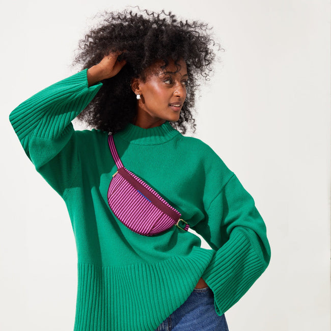 Model wearing The Casual Sling in Sangria Stripe.