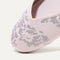 Close up of the rounded toe and v-shaped vamp of The Flat in Burnished Blush. 