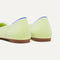 Close up of the heel of The Ballet Flat in Chartreuse, with Rothy's signature blue halo. 