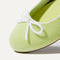 Close up of the rounded toe and bow detail of The Ballet Flat in Chartreuse.