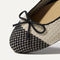 Close up of the rounded toe and bow detail of The Ballet Flat in Coco.
