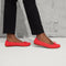 hover | Model wearing The Ballet Flat in Glamour Red. 