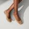 hover | Model wearing The Ballet Flat in Goldstone. 