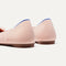 Close up of the heel of The Ballet Flat in Ballerina, with Rothy's signature blue halo. 
