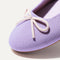 Close up of the rounded toe and bow detail of The Ballet Flat in Bellflower.
