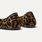 Close up of the heel of The Ballet Flat in Classic Leopard, with Rothy's signature blue halo. 
