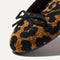 Close up of the rounded toe and bow detail of The Ballet Flat in Classic Leopard. 