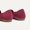 Close up of the heel of The Lounge Loafer in Cabernet, with Rothy's signature blue halo. 