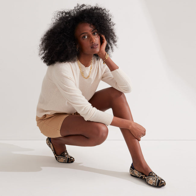 Alternate view of a model wearing The Lounge Loafer in Dark Boho. 