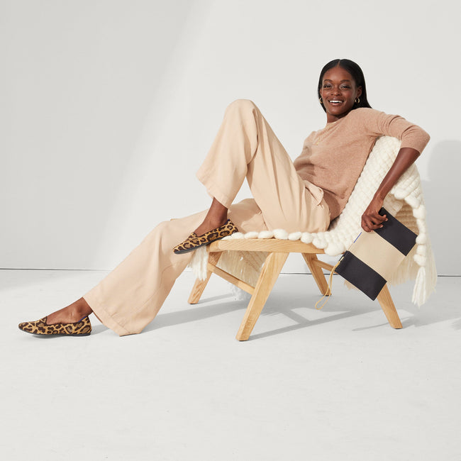 Alternate view of a model wearing The Lounge Loafer in Metallic Cat.