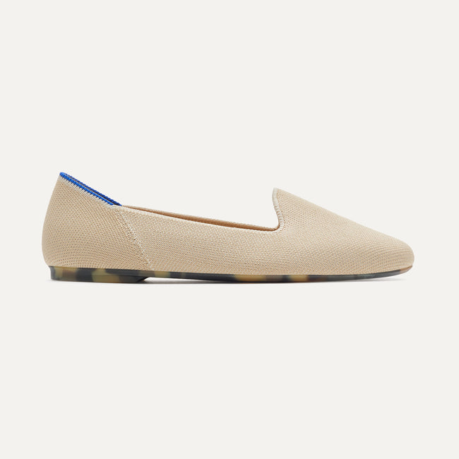 The Lounge Loafer in Sandstone shown from the side.