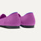 Close up of the heel of The Lounge Loafer in Soft Orchid, with Rothy's signature blue halo. 