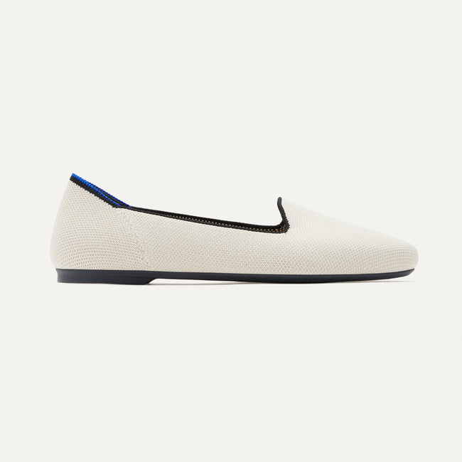 The Lounge Loafer in Vanilla shown from the side.