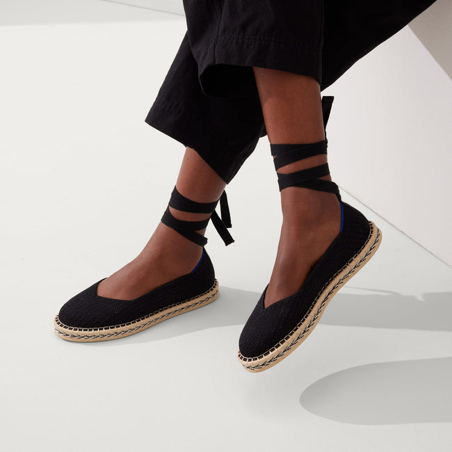 Model wearing The Espadrille in Black. 